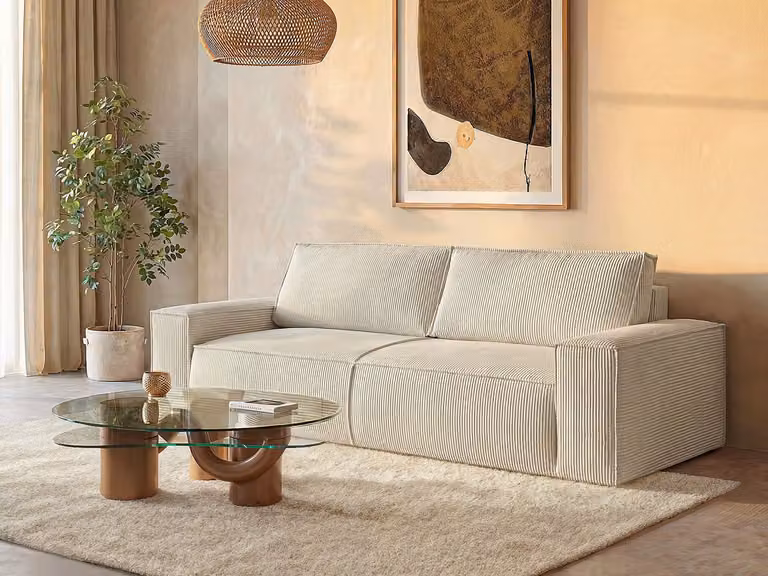 Amelia L-vormige vierzitsslaapbank in beige ribfluweel met slaapfunctie