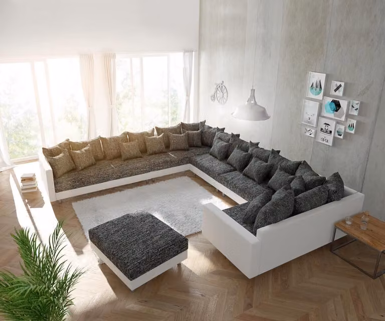 Bank Clovis XXL wit zwart woonlandschap met hocker en armleuning links