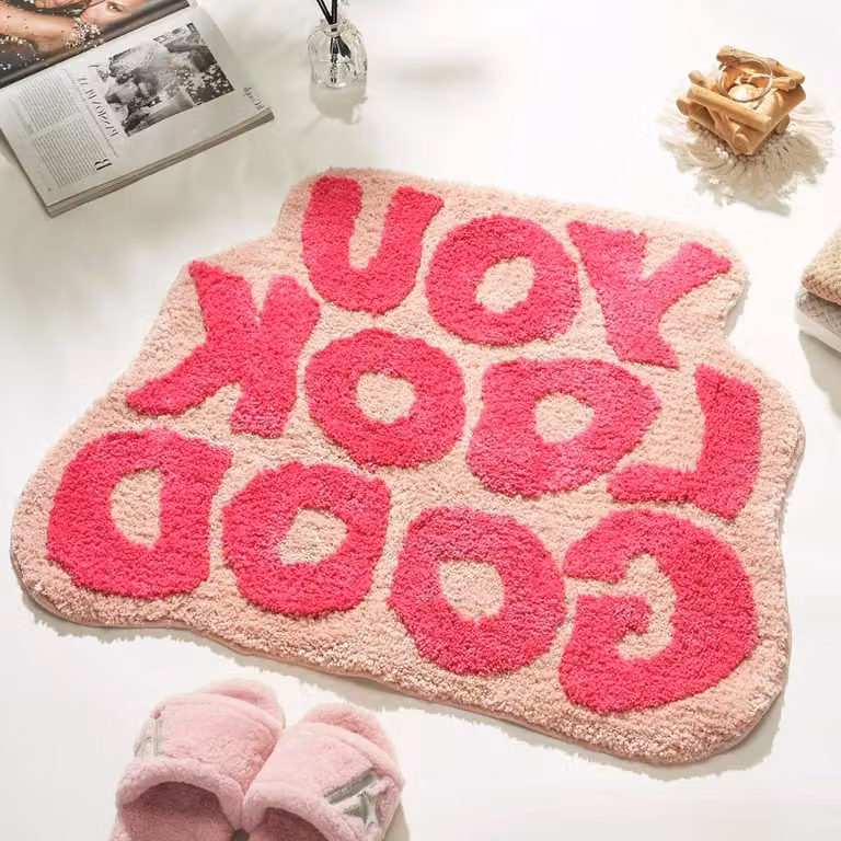 Roze badmat met opbeurende tekst - 61 x 79 cm